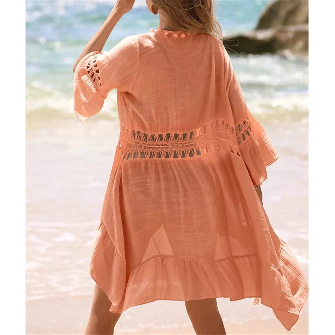 Tunique de plage crochet orange corail vue de dos, bandes en crochet ajourées et manches évasées