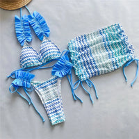 Maillot de bain trois pièces à volants avec jupe bleu à plat, haut et bas à volants bleus, jupe à lacets