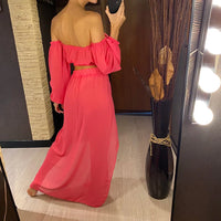 Ensemble de plage épaules dénudées rose fuchsia vu de dos, haut à manches bouffantes et jupe longue transparente