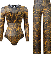 Pantalon jaune à motifs dorés et noirs du maillot de bain manches longues, taille haute et jambes droites posé à plat