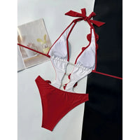 Maillot de bain une pièce fleurs en relief échancré rouge vu à plat côté doublure, perles et bretelles nouées