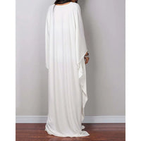 Robe de plage longue kaftan manches chauve-souris blanc vue de dos sur fond gris, manches amples et tombée jusqu'au sol