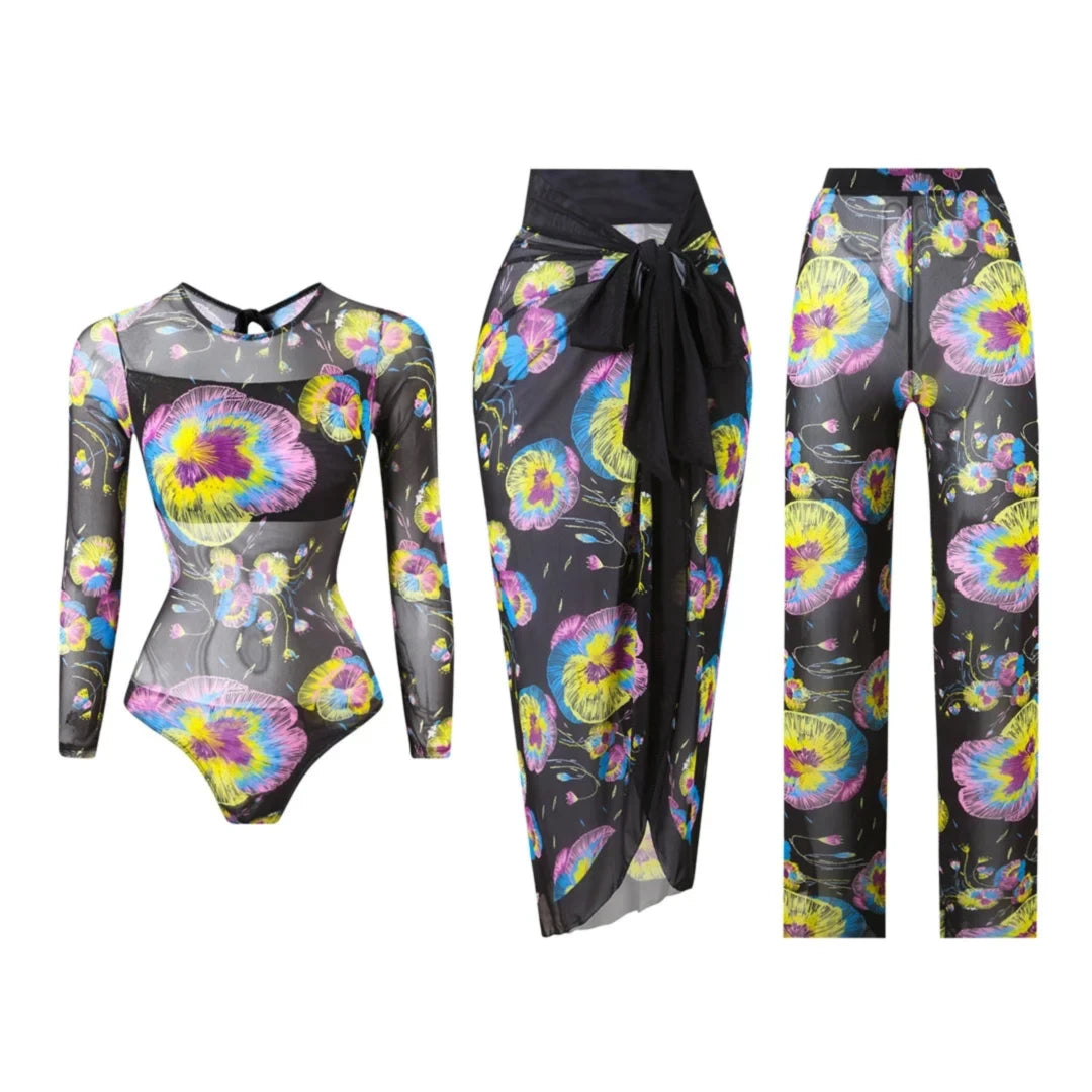 Maillot trois pièces manches longues imprimé fleuri noir, body, paréo et pantalon en mesh posés à plat