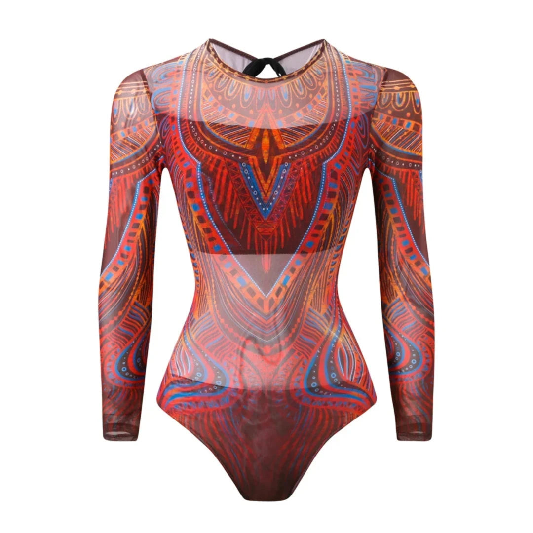 Maillot de bain une pièce manches longues rouge brique posé à plat de face, tissu transparent et motifs bleus
