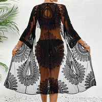 Cardigan de plage brodé en mousseline demi-manches noir vu de dos, ample et long, motifs en rosace